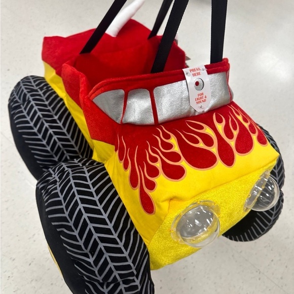 - FAO Schwarz Monster Truck Costume W/Lights and Sounds